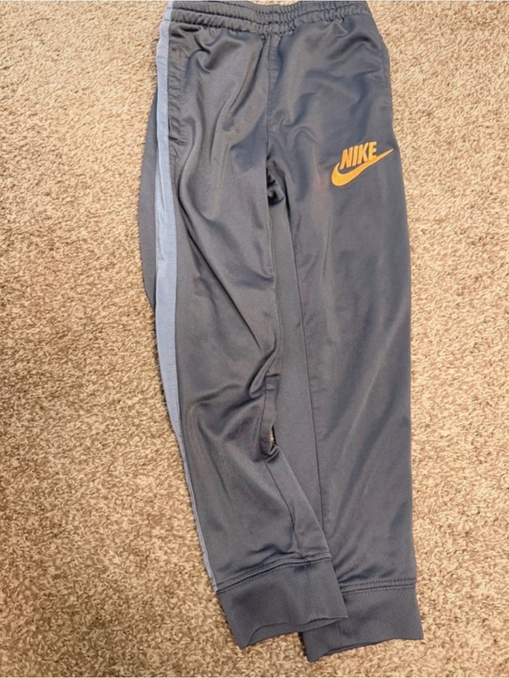 Nike Kids Navy Joggers with Gold Logo and Light Blue Side Stripe